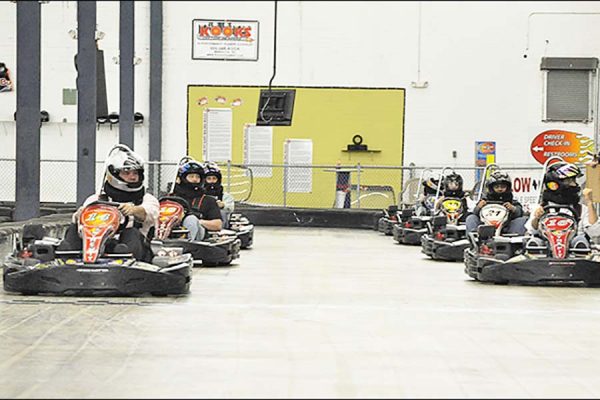 Go karts on track at The PIT Indoor Kart Track