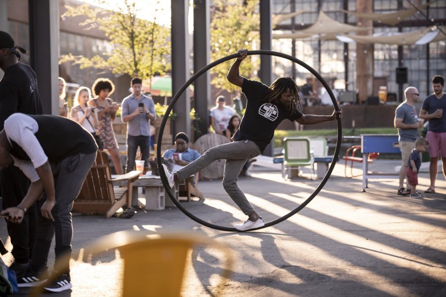 Street performer in a ring at Camp North End Charlotte NC