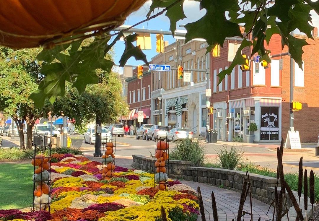 fall pumpkins and mums on Main Street in Mooresville NC